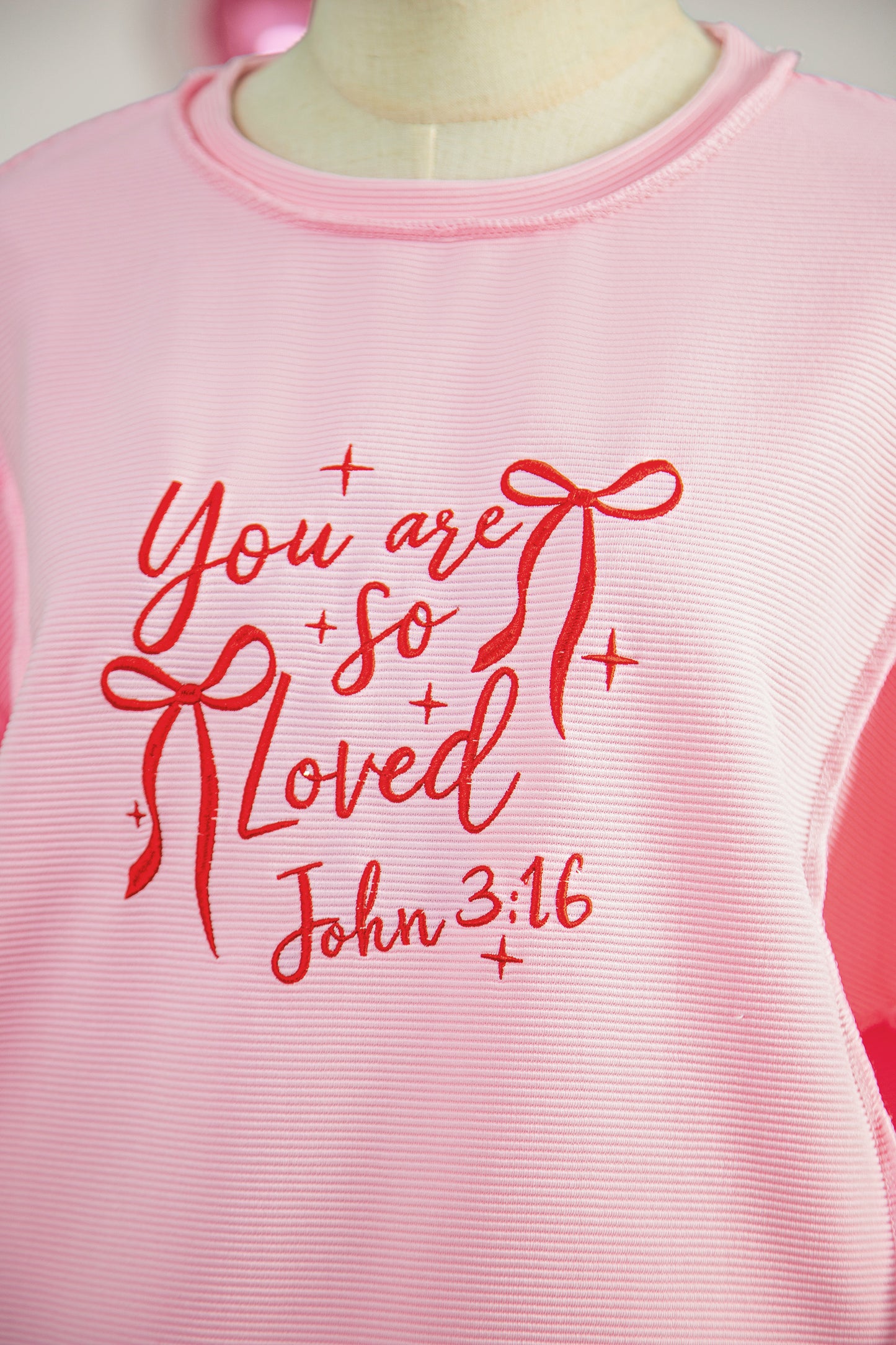 "You are so loved"  Bow Embroidered Graphic Pullover Top